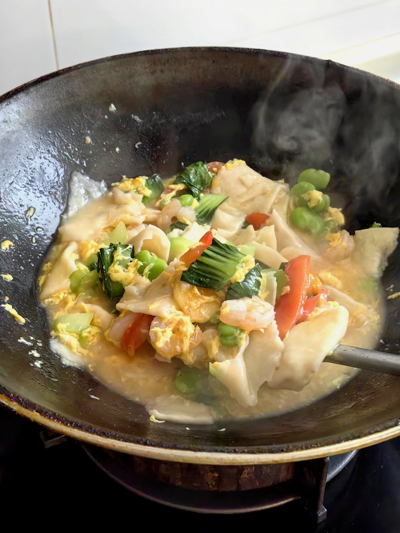 Steps of making mixed vegetable and fresh shrimp bun (noodle soup): 16